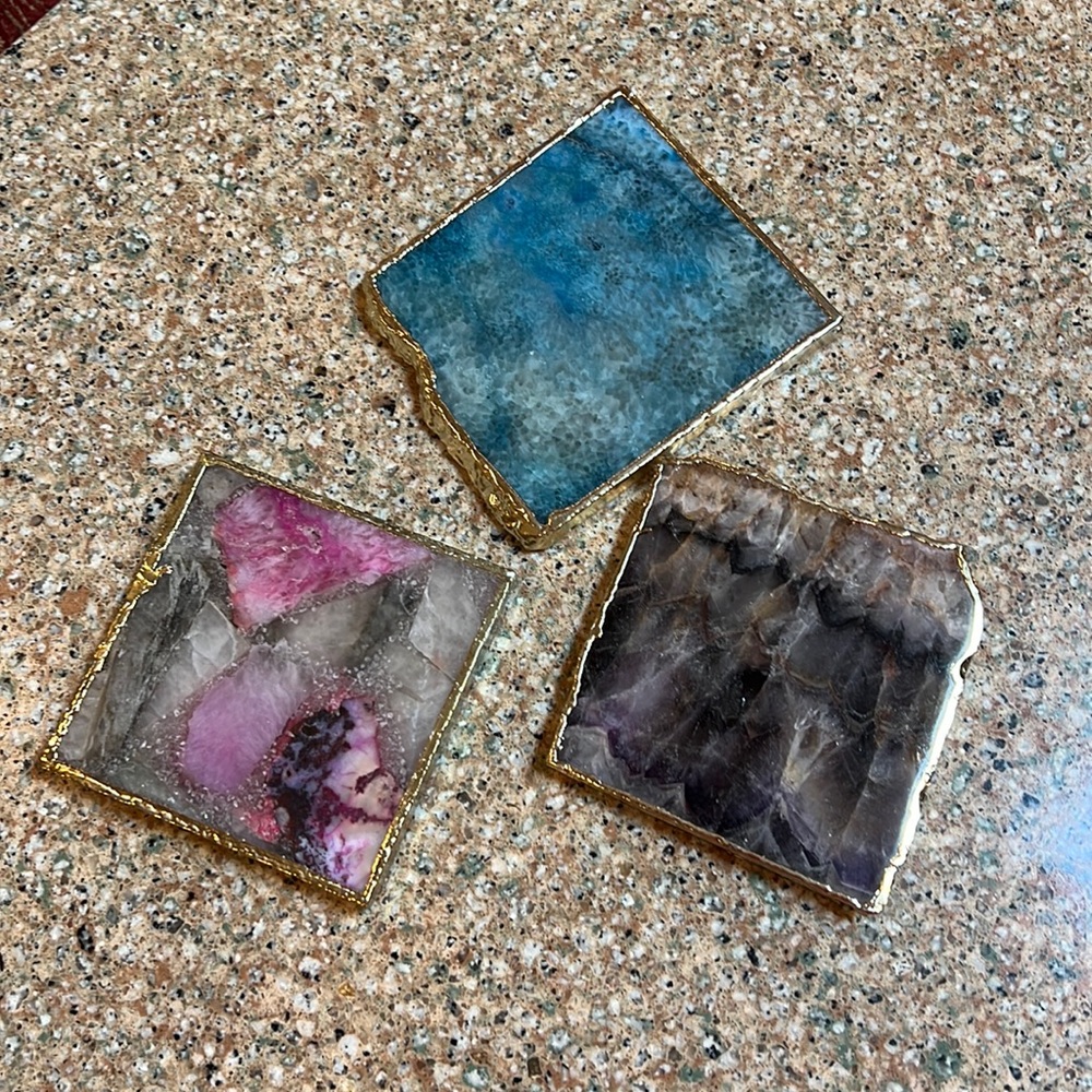 Anthropologie set of 3 wine bottle coasters.